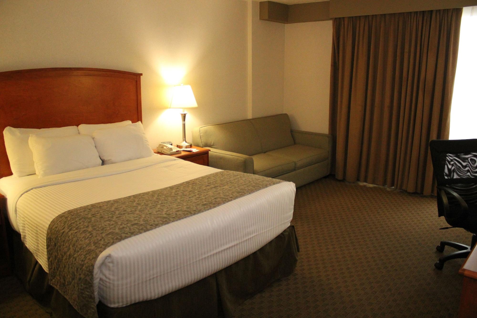Отель Ramada By Wyndham Edmonton South Экстерьер фото
